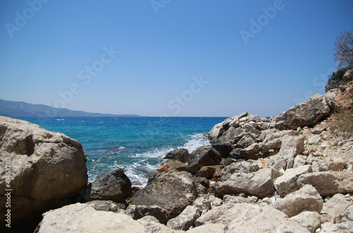 Lagoon with turquoise water and large rocks, beautiful sea view