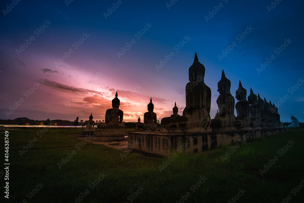 Many Statue buddha image with thunder at night in southen of Thailand Many Statue buddha image with thunder at night in southen of Thailand