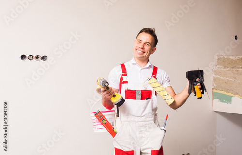 Fully equiped professional repairman ready for work photo