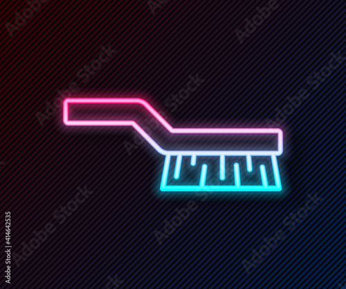 Obraz na plátně Glowing neon line Pool table brush icon isolated on black background