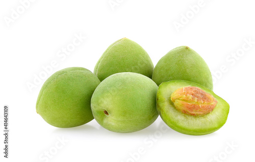 Green plum isolated on white background