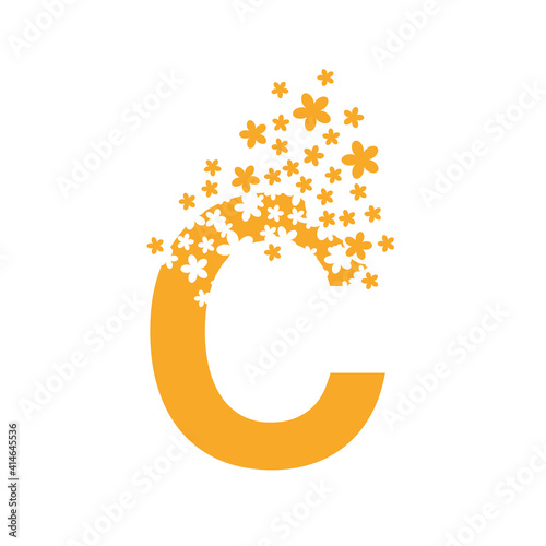 The letter C dissolves into a cloud of flowers