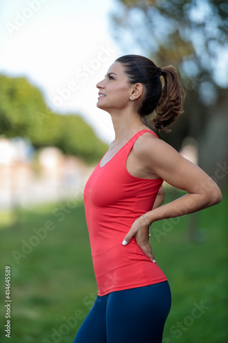 Young athletic woman doing exercised outdoor