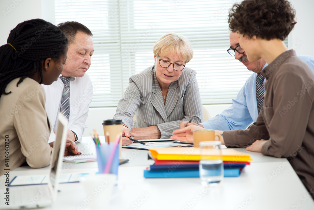 Business people working together in the office Business people working together in the office
