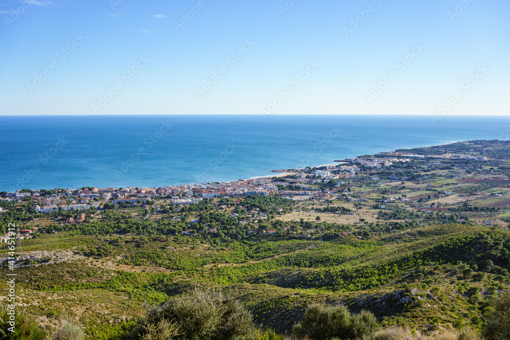 Mediterranean coast in Spain, holiday area with lots of vegetation and calm sea