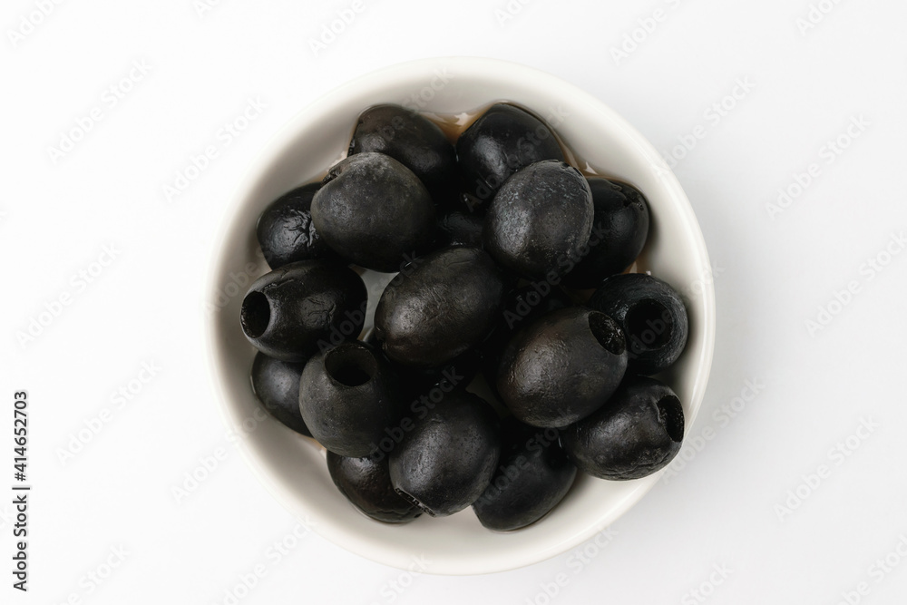 Black olives on a white background Black olives on a white background