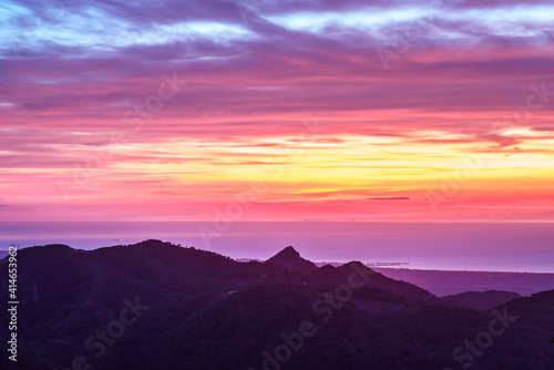 Colourful sunrise over the Spanish Mediterranean coast in La Plana Region.