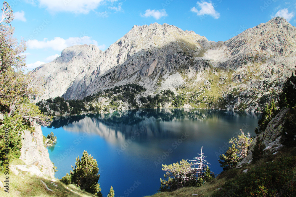 Black lake in Lakes de San Mauricio National Park, Catalonia, Spain	