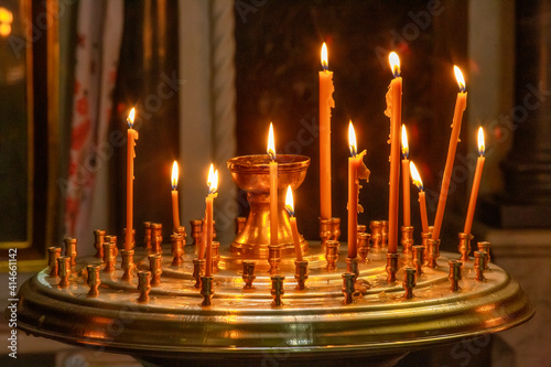 Candles in orthodox church, traditional religious scene
