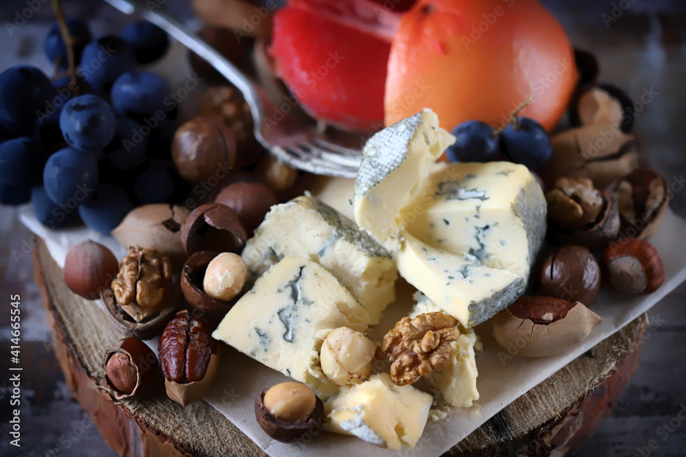 Gorgonzola cheese with nuts and fruits. Cheese plate. Wine appetizer. Gorgonzola cheese with nuts and fruits. Cheese plate. Wine appetizer.