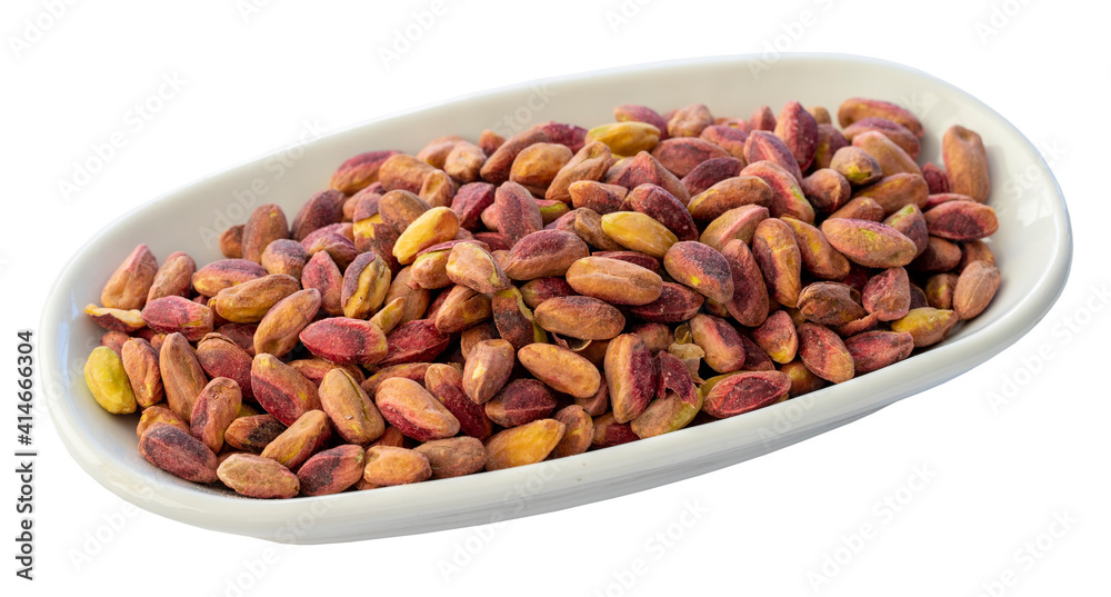 Pistachio kernels isolated on white background Pistachio kernels isolated on white background