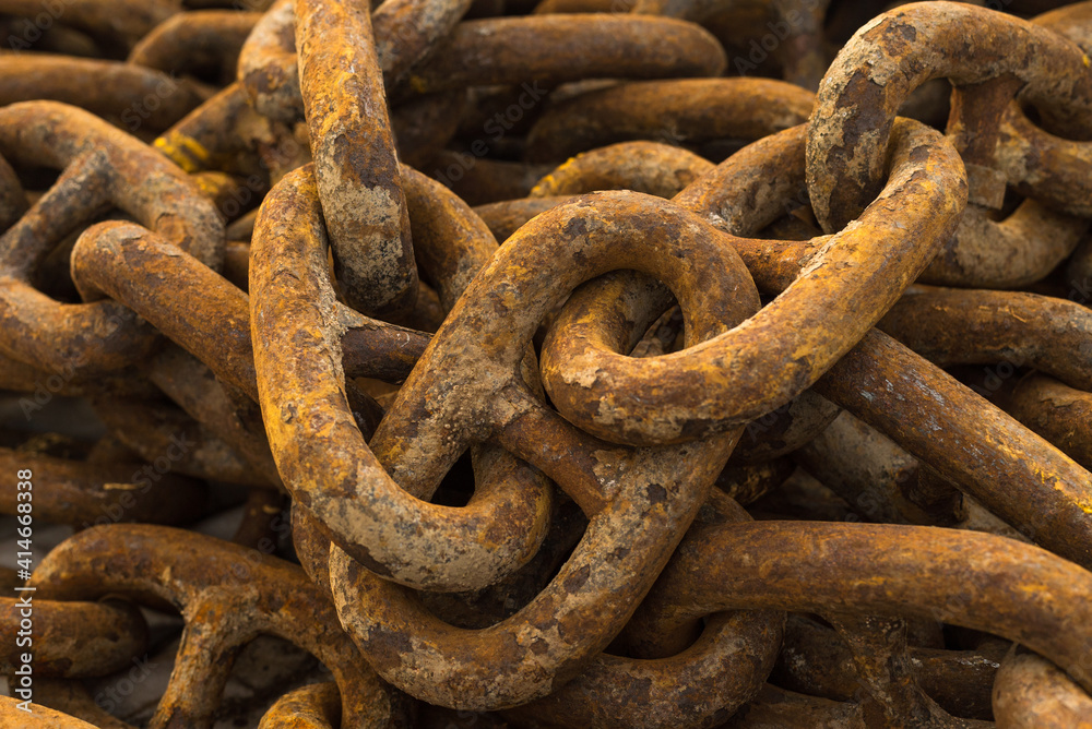 Large iron anchor chain. A rusty chain link. Corrosion. Shackles. Large iron anchor chain. A rusty chain link. Corrosion. Shackles.
