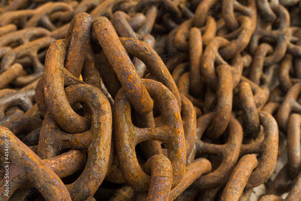 Large iron anchor chain. A rusty chain link. Corrosion. Shackles. Large iron anchor chain. A rusty chain link. Corrosion. Shackles.