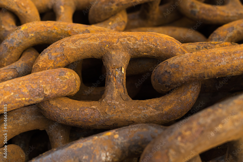 Large iron anchor chain. A rusty chain link. Corrosion. Shackles. Large iron anchor chain. A rusty chain link. Corrosion. Shackles.