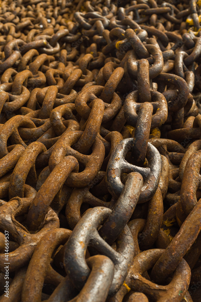 Large iron anchor chain. A rusty chain link. Corrosion. Shackles. Large iron anchor chain. A rusty chain link. Corrosion. Shackles.