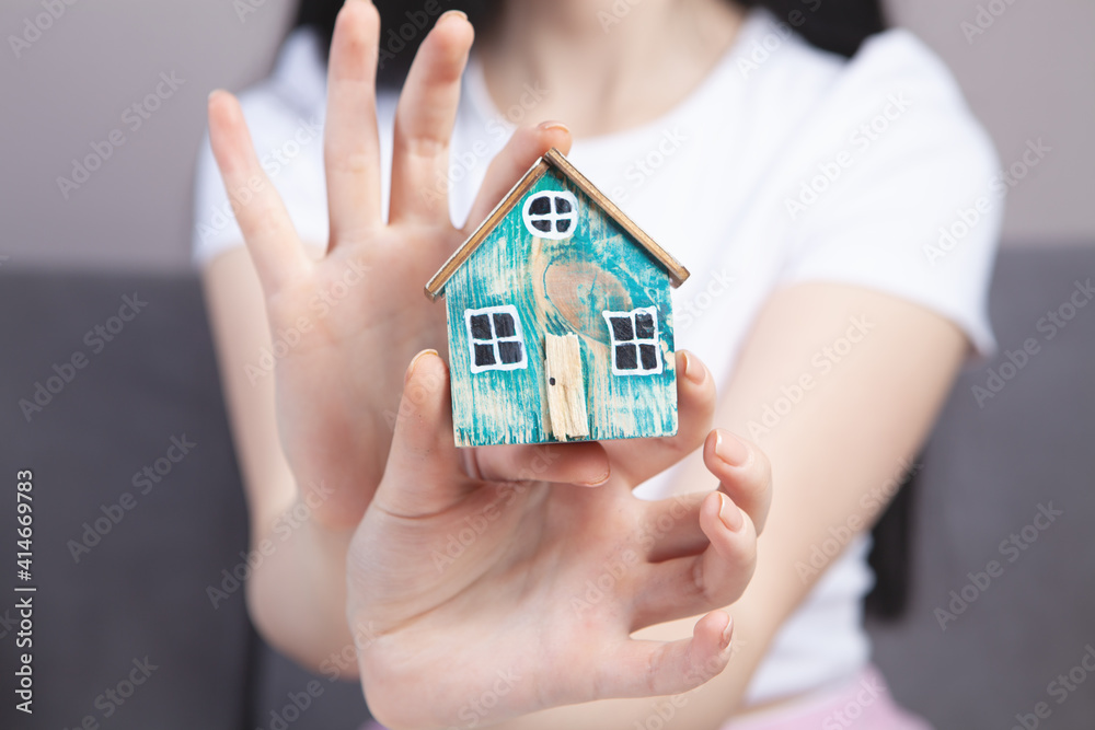 girl holding a model at home girl holding a model at home