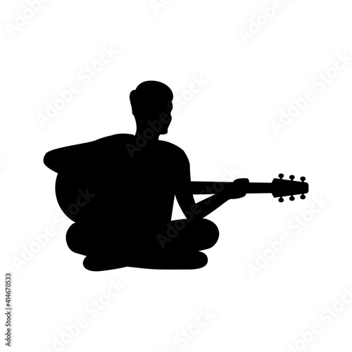 black silhouette design with isolated white background of man playing guitar