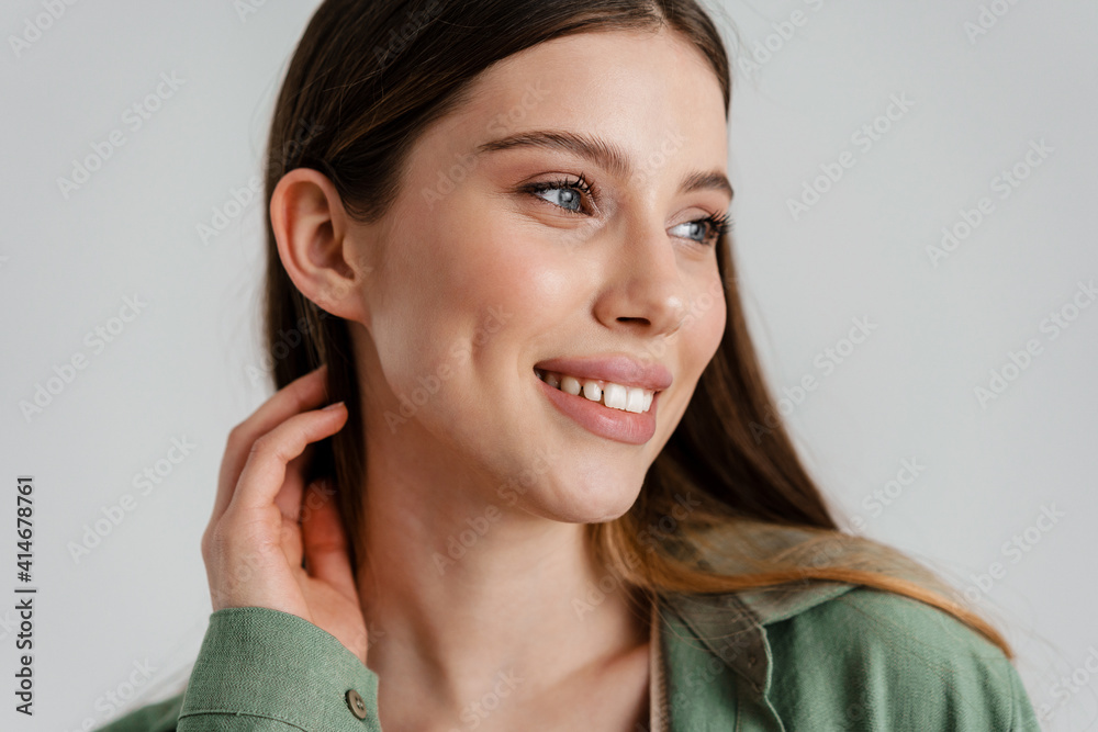 Happy caucasian nice girl smiling and looking aside Happy caucasian nice girl smiling and looking aside