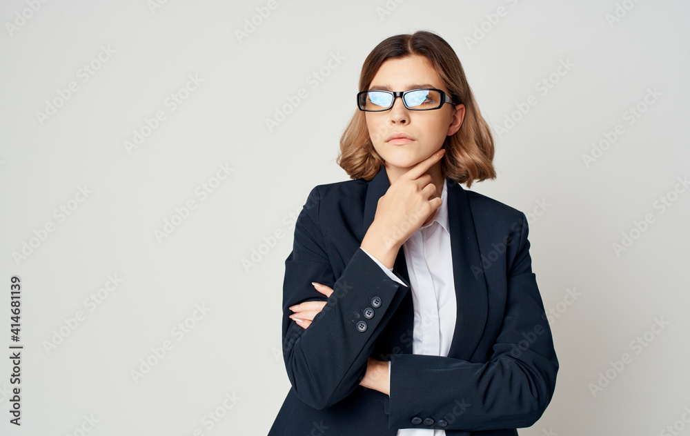 Business woman in classic suit on a light background Copy Space cropped view