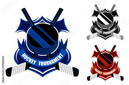 ice hockey sporting emblems. Sport black rubber puck and crossed sticks for ice hockey on background of stylized shield. Tournament symbol. Easy to edit color. Vector