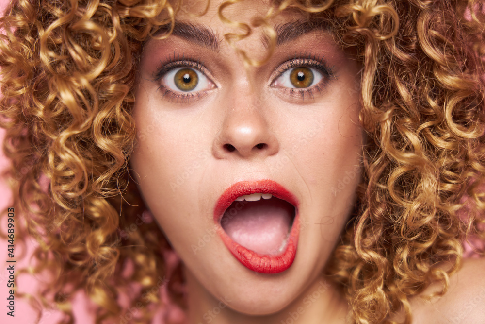 woman Curly hair grimace open mouth close-up bright makeup woman Curly hair grimace open mouth close-up bright makeup