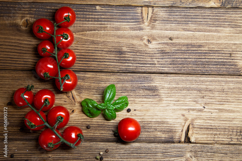 Cherry tomatoes on rustic background