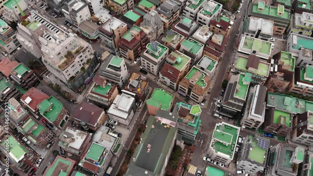 Aerial view of residential area at Samseong-dong, roofs of family houses, compact low-rise buildings at central district of Seoul. Expensive housing estate of Gangnam Aerial view of residential area at Samseong-dong, roofs of family houses, compact low-rise buildings at central district of Seoul. Expensive housing estate of Gangnam