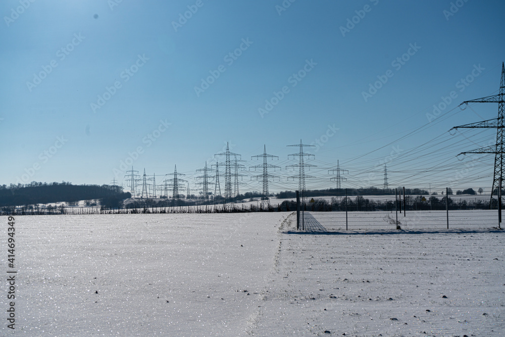 power pole in winter landscape