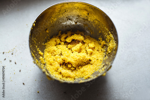 Black ants in a corn plate. Background texture.