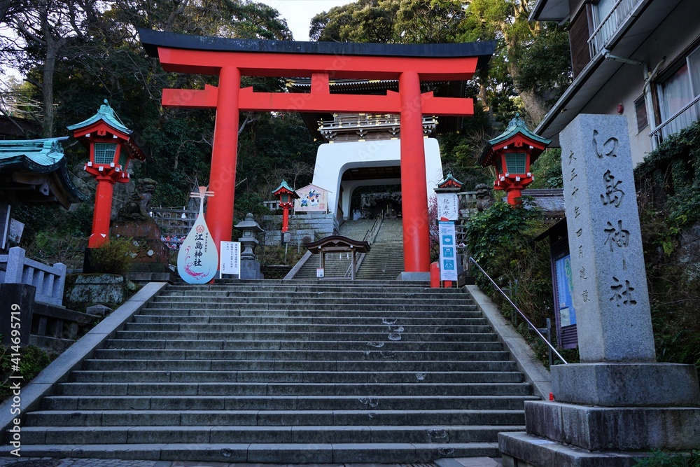 Red Torii gate at Enoshima Shrine (Hetsunomiya) in Kanagawa prefecture, Japan- 鳥居 江島神社 神奈川県 日本 Red Torii gate at Enoshima Shrine (Hetsunomiya) in Kanagawa prefecture, Japan- 鳥居 江島神社 神奈川県 日本