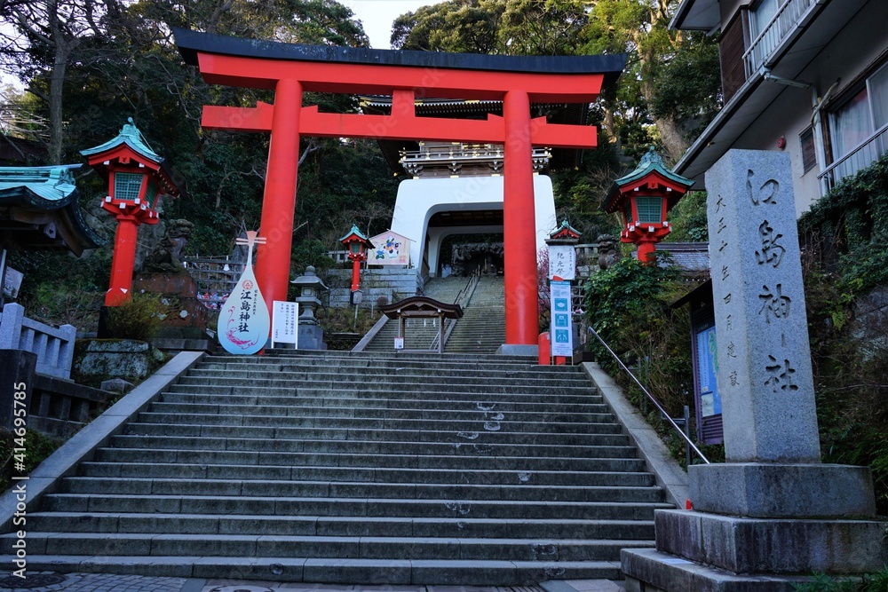 Red Torii gate at Enoshima Shrine (Hetsunomiya) in Kanagawa prefecture, Japan- 鳥居 江島神社 神奈川県 日本 Red Torii gate at Enoshima Shrine (Hetsunomiya) in Kanagawa prefecture, Japan- 鳥居 江島神社 神奈川県 日本