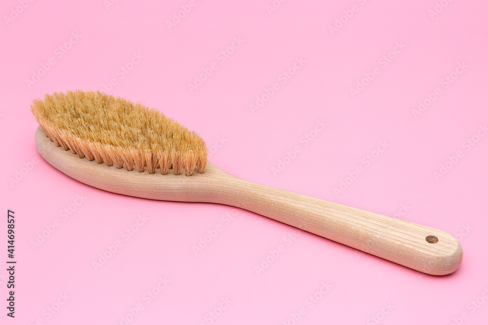massage brush on a pink background massage brush on a pink background