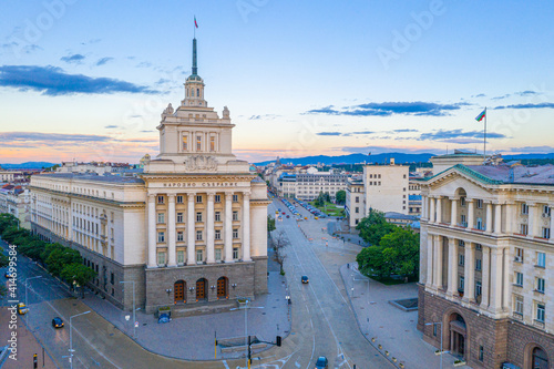 Sunset view of Largo square in Sofia with national assembly building (written in cyrillic on the picture), Bulgaria photo