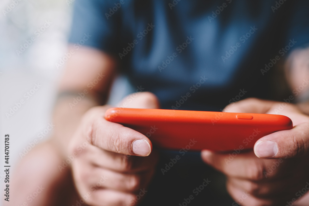 Man typing message on mobile phone Man typing message on mobile phone