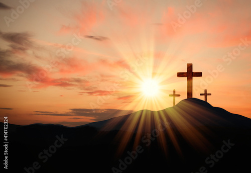 Obraz na plátne Christian crosses on hill outdoors at sunset