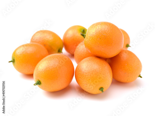 kumquat on white background