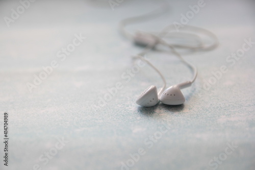 White Headphones On A blue Background, Earphone, accessory.