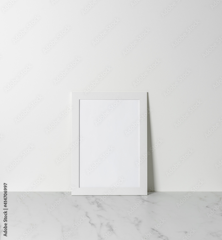 Photo or poster empty frame mock up on marble table Photo or poster empty frame mock up on marble table