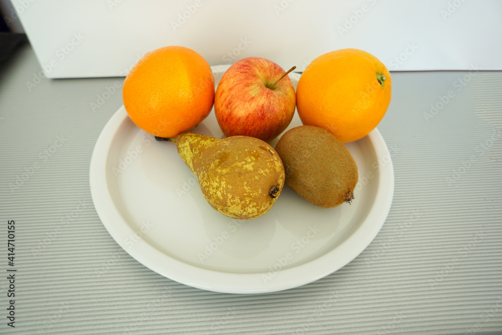 Fresh fruit in the hospital photographed on the tray with natural light