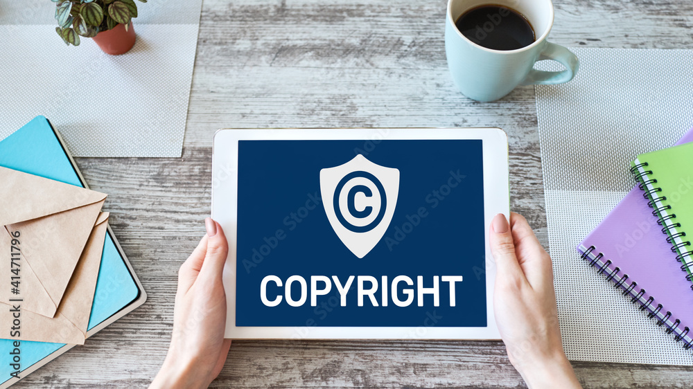Copyright icon on screen. Patent Law and Intellectual Property. Business, Internet and Technology Concept. Copyright icon on screen. Patent Law and Intellectual Property. Business, Internet and Technology Concept.