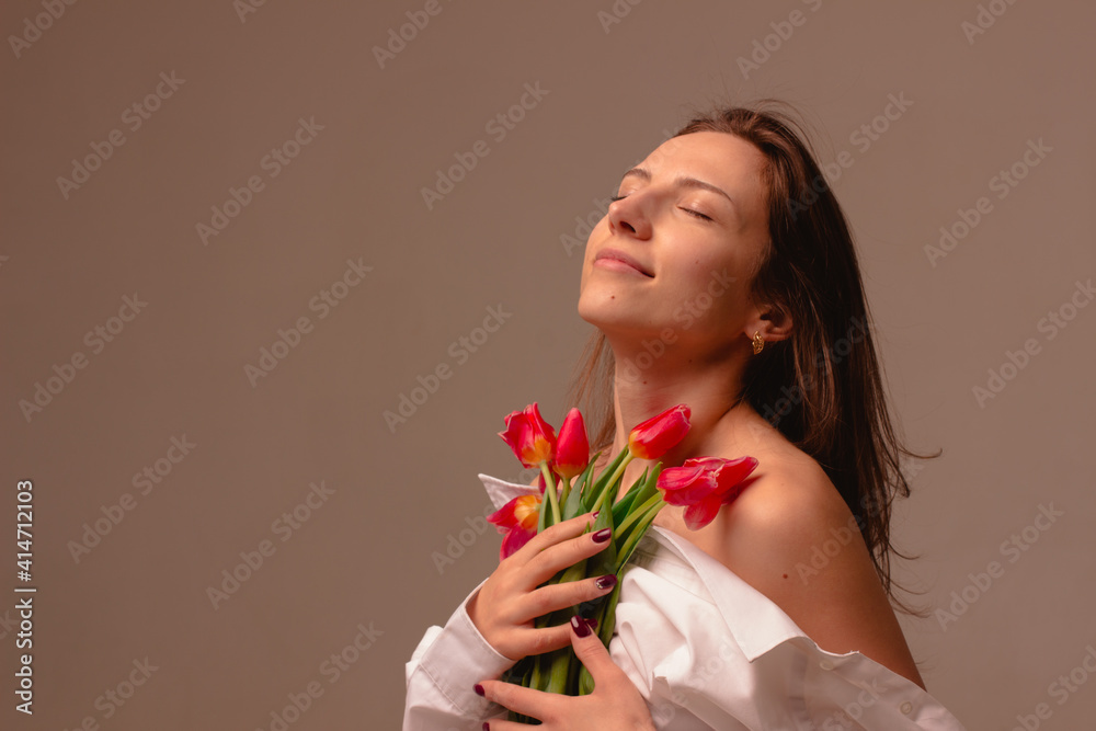 portrait of a sensual girl in profile with flowing hair and bare ...
