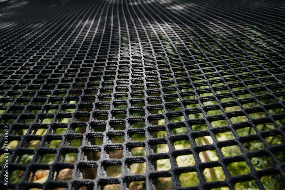 Fototapeta premium Wire grid fence pattern, perspective view. Concept of safety.