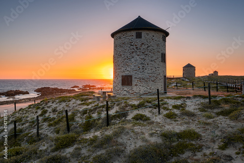 Moinhos de Apulia mills near the beach, in Portugal photo