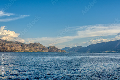Scenery view of rocky slope over the lake in British Columbia © Imagenet