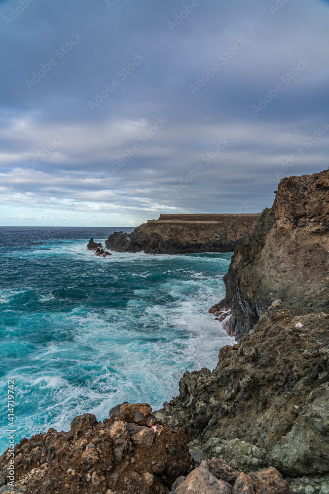 A powerful storm in the Atlantic Ocean in a bay on the coastline of Tenerife.