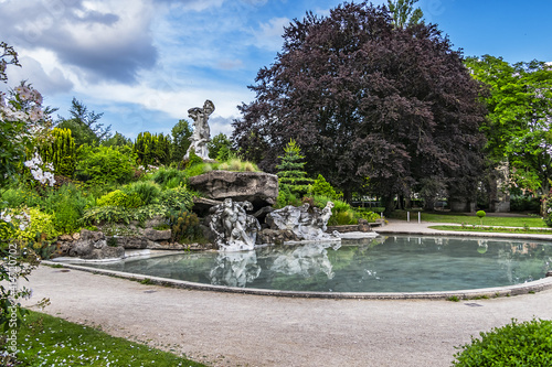Louis Pasteur Park (parc Louis-Pasteur) is a four-hectare French public garden in city of Orleans. Pond with sculptures. Orleans is a city in north-central France, about 111 km southwest of Paris.