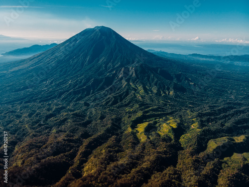 Aerial view of Agung volcano with forest in Bali