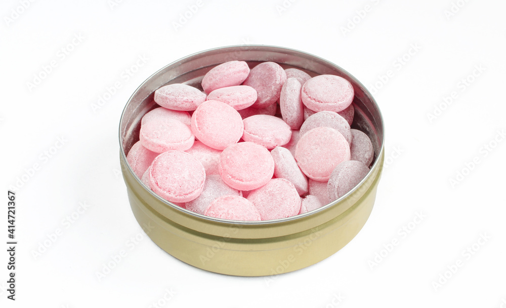 Metallic container full of hard candies isolated on white background. Tasty bonbons Metallic container full of hard candies isolated on white background. Tasty bonbons