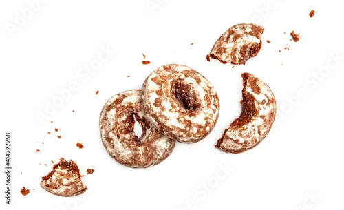 Chopped gingerbread cookies with sugar icing isolated on white background with clipping path top view