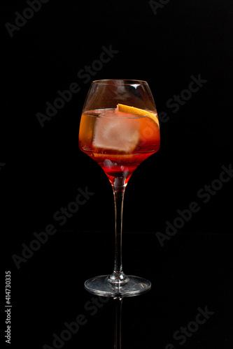 aperol spritz wine cocktail prosecco on black background. photo